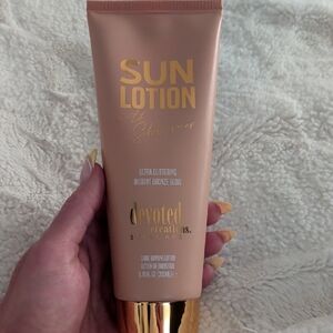 Devoted Creations Sun Lotion with Shimmer — Peach Bronze